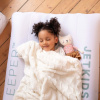 Stokke CloudSleeper — компактная детская кроватка для путешествий